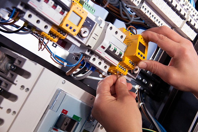 Electrician working on installation